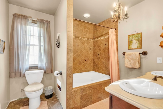 full bathroom featuring shower / bath combo, toilet, vanity, an inviting chandelier, and tile patterned flooring