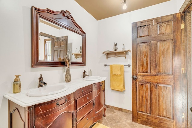 bathroom featuring vanity and tile patterned flooring