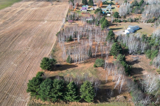 birds eye view of property featuring a rural view