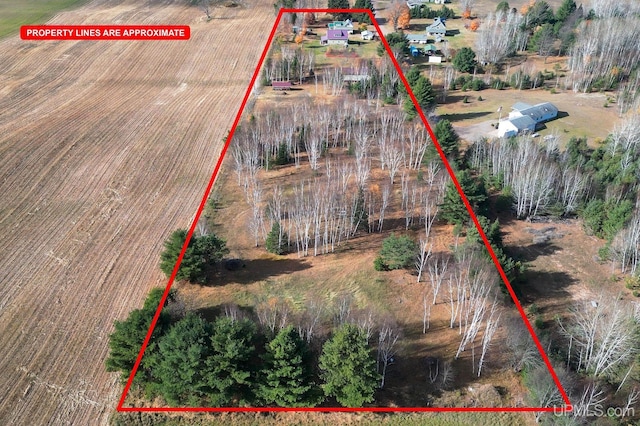 aerial view of sparsely populated area with property parcel outlined