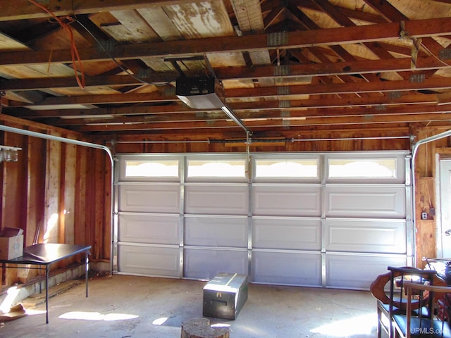 garage featuring a garage door opener