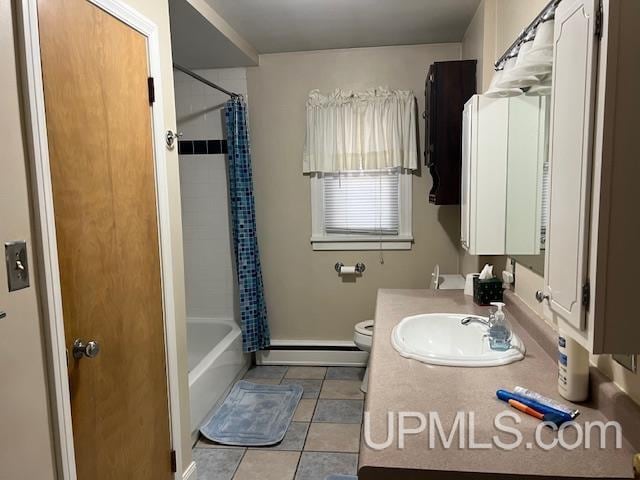 full bathroom with toilet, tile patterned flooring, shower / bath combo with shower curtain, a baseboard radiator, and vanity