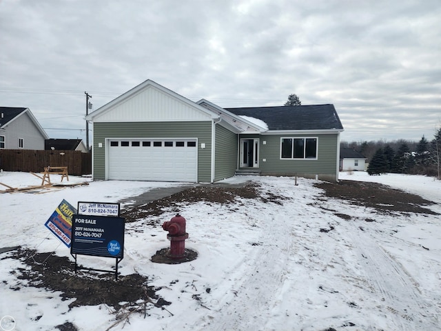 view of front of home featuring a garage