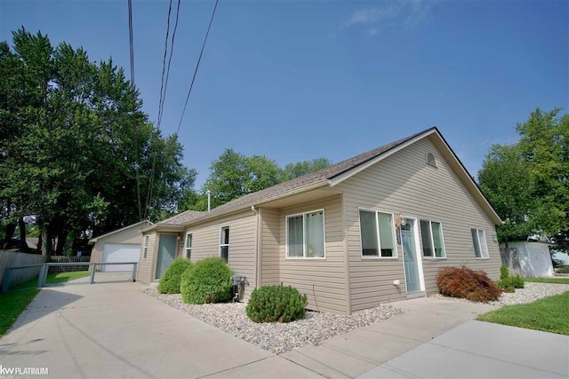 view of front of house with an outbuilding