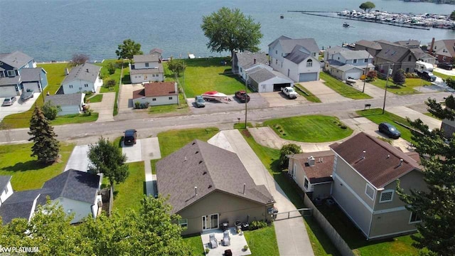 drone / aerial view with a water view