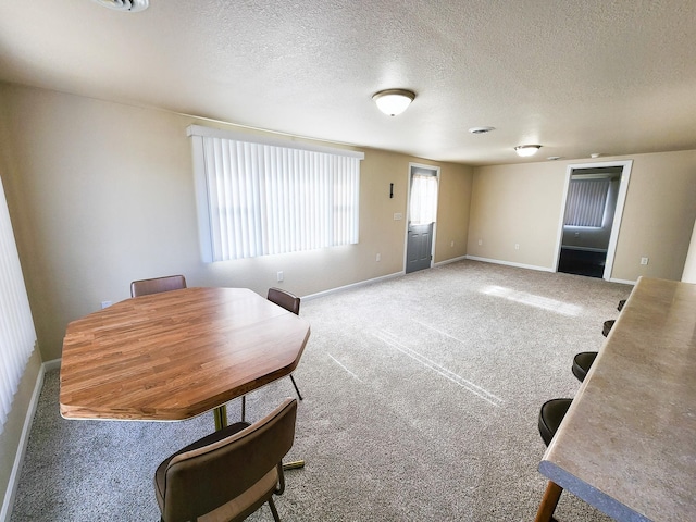 interior space featuring a textured ceiling