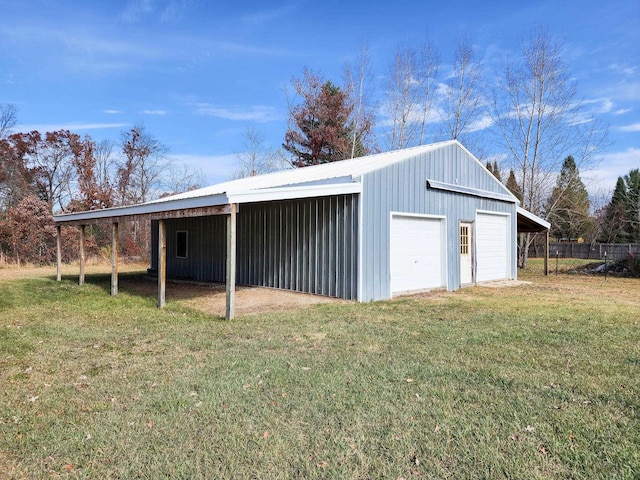 view of outbuilding featuring a yard and a garage