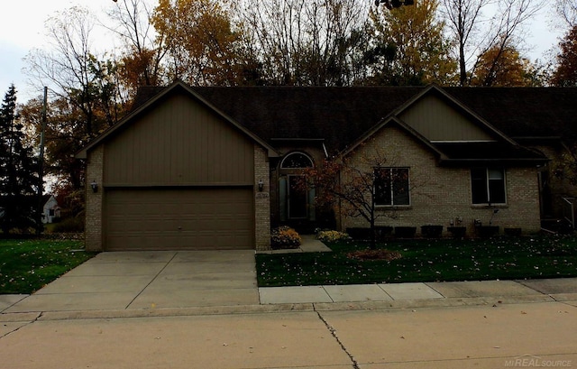 ranch-style house featuring a garage