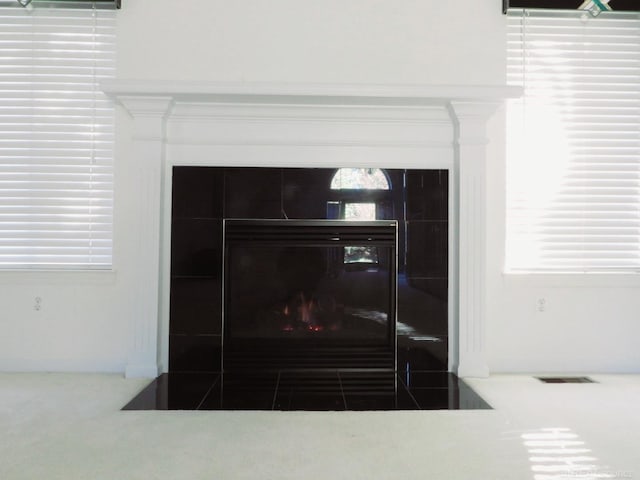 room details with a tile fireplace