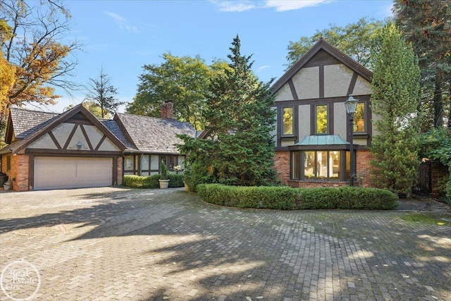 tudor home with a garage