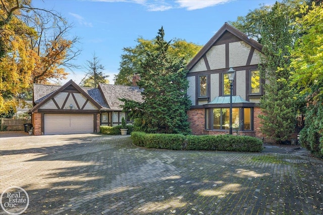 tudor home with a garage