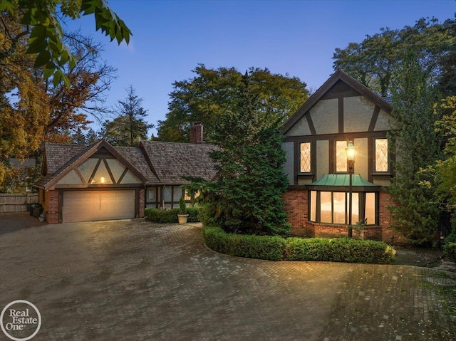 tudor home with a garage