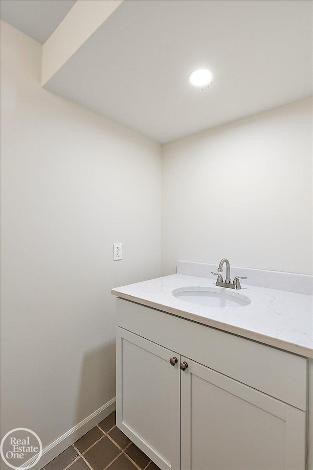 bathroom featuring vanity and tile patterned flooring