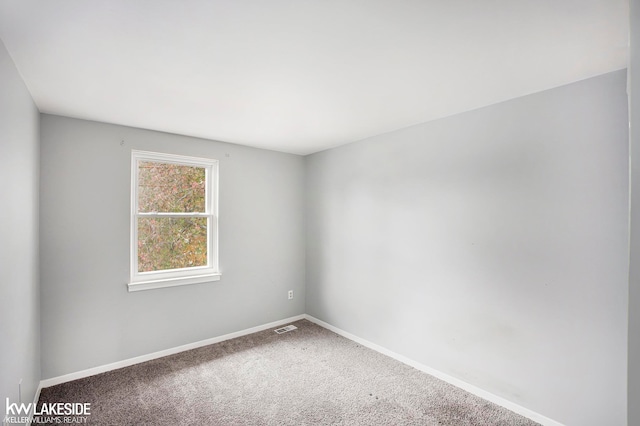 view of carpeted spare room