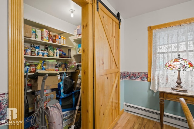 pantry featuring a baseboard radiator