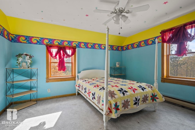 bedroom with a baseboard radiator, carpet floors, and ceiling fan