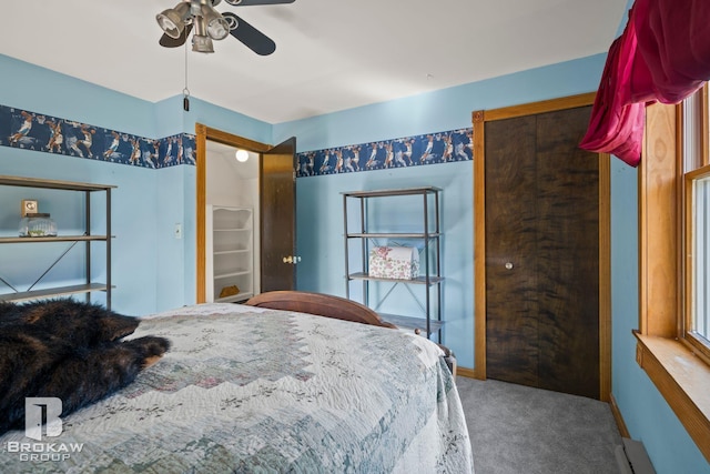 bedroom featuring carpet and ceiling fan