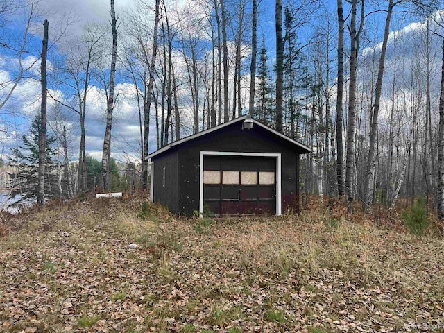 view of outbuilding featuring a garage