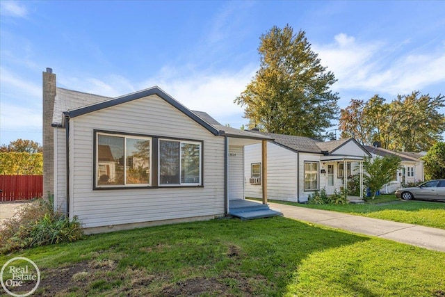 ranch-style home with a front yard