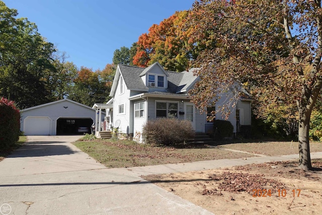 view of front facade with an outdoor structure and a garage