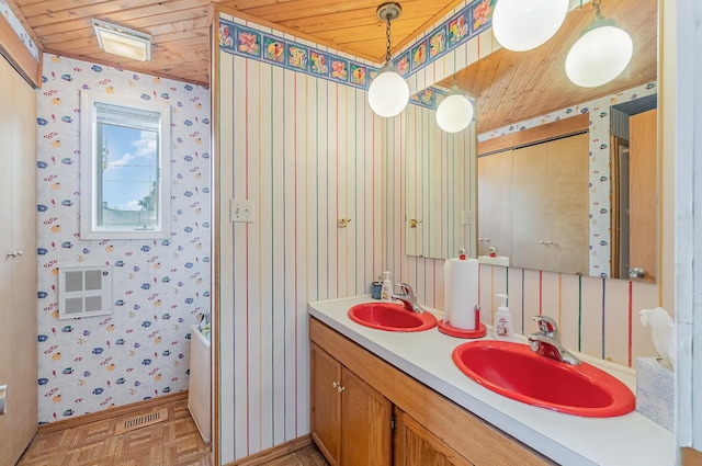 bathroom featuring vanity, wood ceiling, and parquet flooring