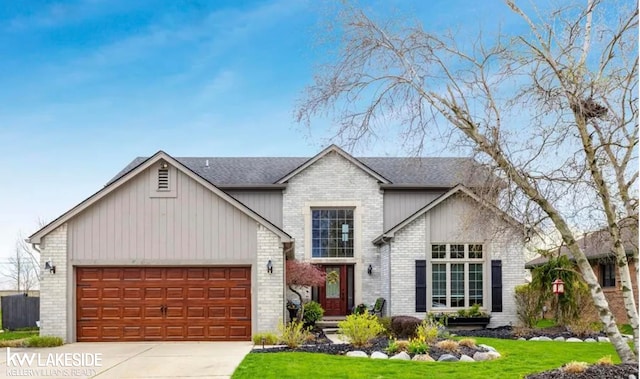 view of front property featuring a garage and a front yard