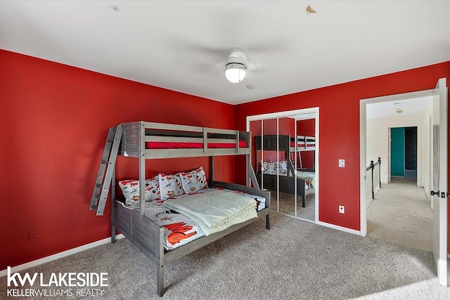 bedroom featuring a closet, carpet, and ceiling fan