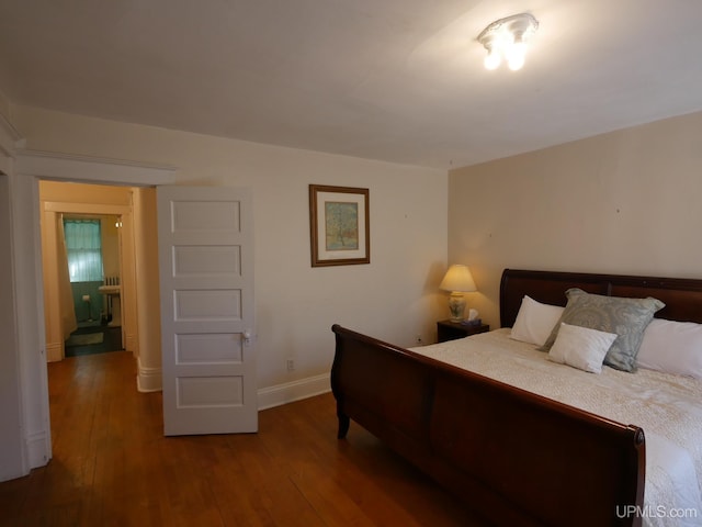 bedroom featuring hardwood / wood-style flooring