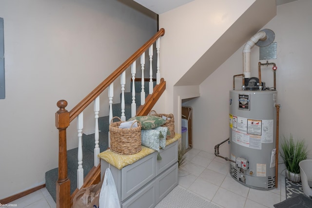 utility room with gas water heater