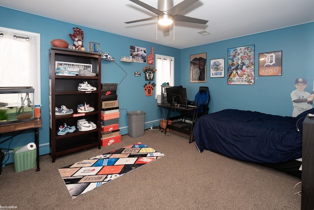 bedroom featuring ceiling fan and carpet flooring