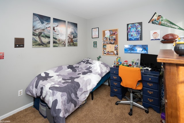 bedroom featuring light carpet