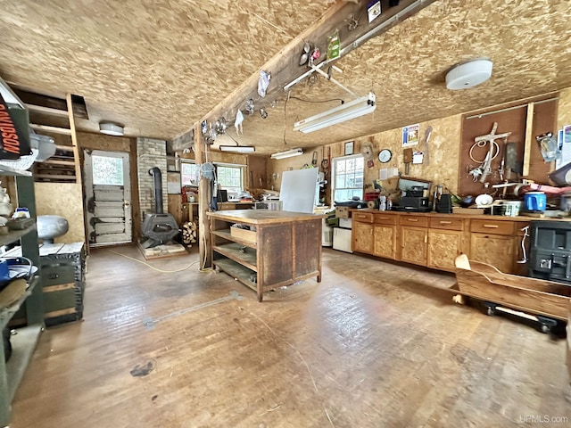 interior space featuring a wood stove