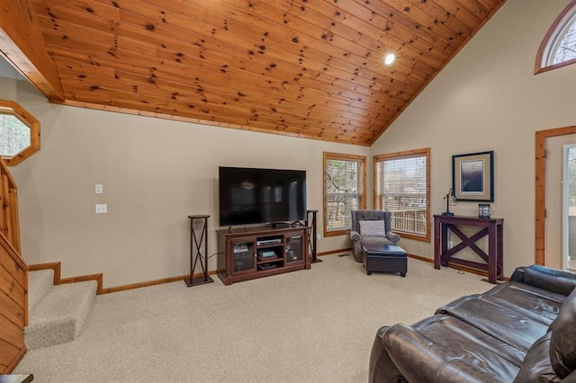 carpeted living room featuring a wealth of natural light, high vaulted ceiling, and wooden ceiling