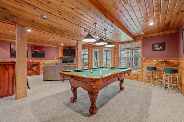 game room featuring light carpet, wood ceiling, and wood walls