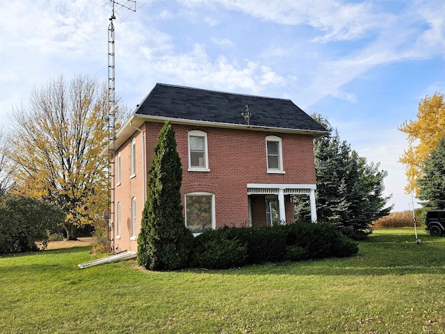 view of front of home with a front yard