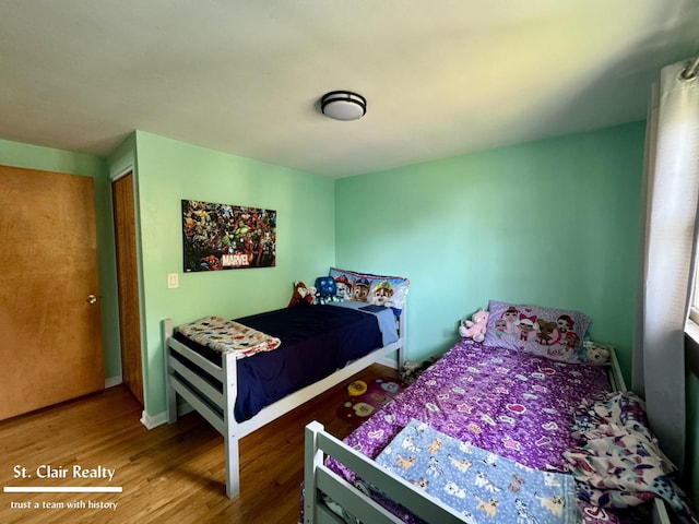 bedroom featuring hardwood / wood-style flooring