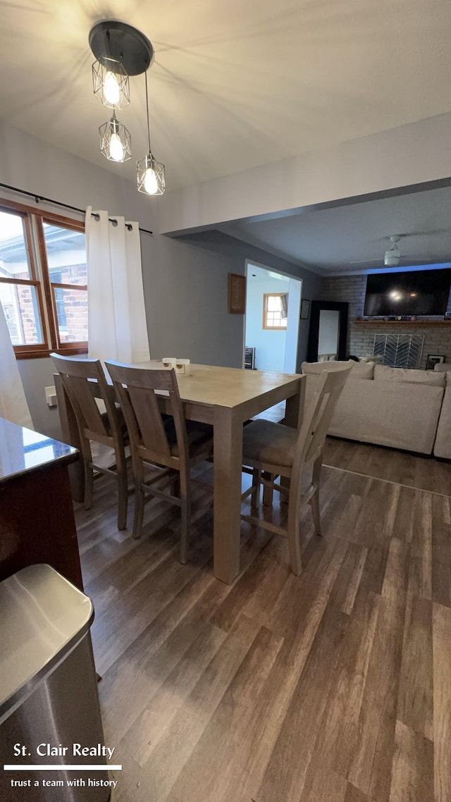 dining space featuring dark hardwood / wood-style floors