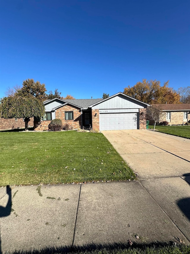 single story home with a garage and a front yard