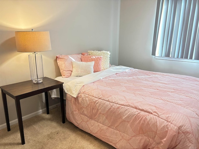 bedroom with light carpet