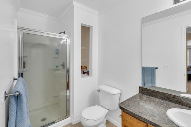 bathroom featuring vanity, toilet, crown molding, and walk in shower