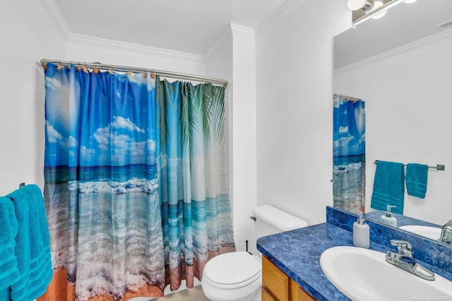 bathroom with toilet, ornamental molding, and vanity