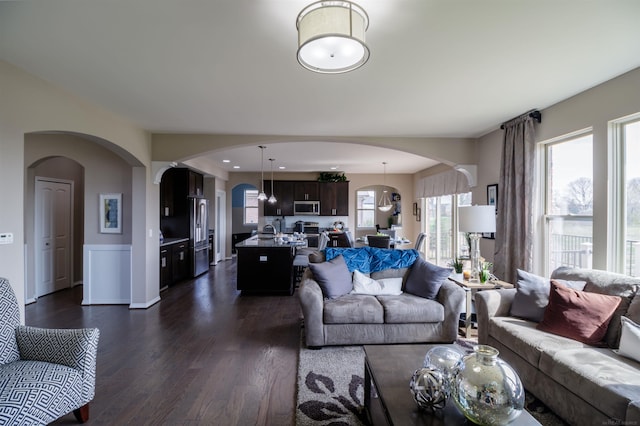 living room with dark wood-type flooring