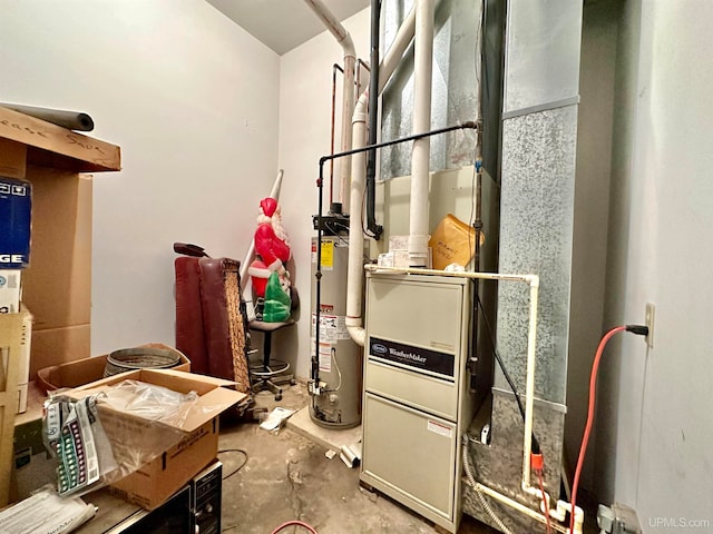 utility room with gas water heater