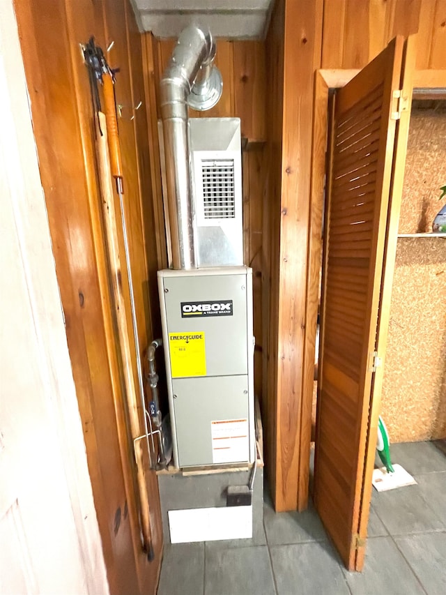 utility room with heating unit