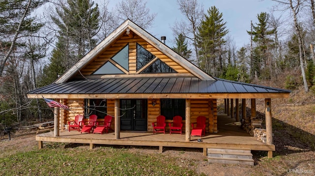 exterior space featuring a wooden deck