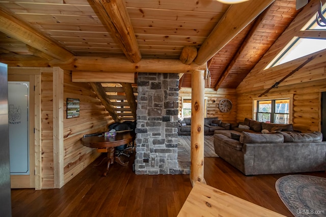 unfurnished living room with wood ceiling, hardwood / wood-style flooring, lofted ceiling with skylight, and wood walls