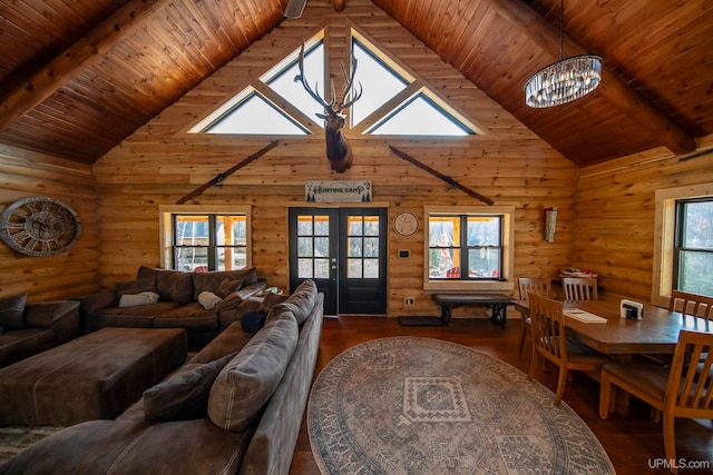 living room featuring french doors, dark wood-type flooring, and a wealth of natural light