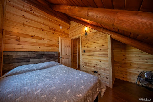 unfurnished bedroom with hardwood / wood-style floors, lofted ceiling, wooden walls, and wooden ceiling