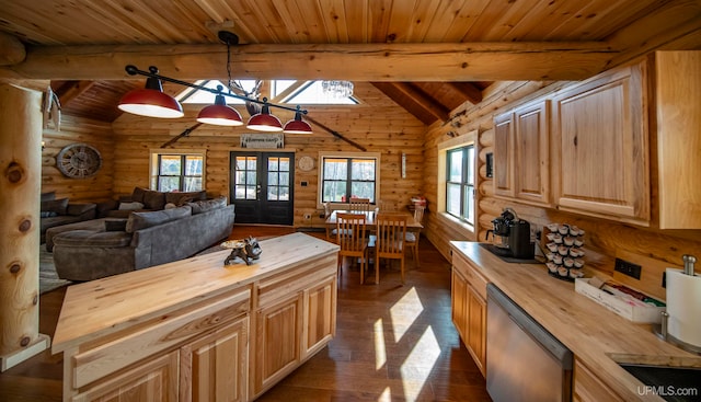 kitchen featuring wooden counters, dishwasher, vaulted ceiling with beams, dark wood-type flooring, and decorative light fixtures