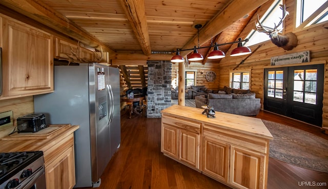 kitchen featuring beam ceiling, hanging light fixtures, dark hardwood / wood-style flooring, french doors, and butcher block countertops